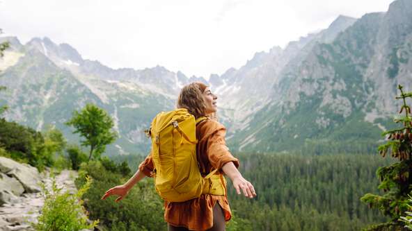 Lady hiker in nature.jpg?sw=592&cx=0&cy=0&cw=6802&ch=3827&q=60